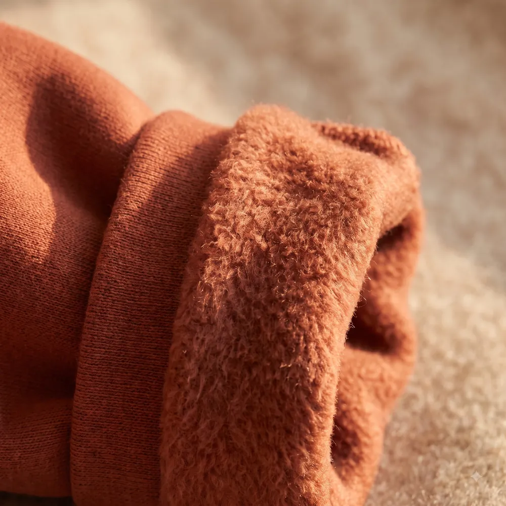Terracotta heavyweight fleece showing the brushed inner side